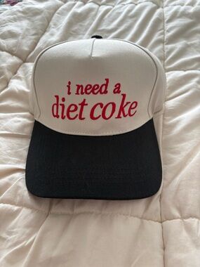 White and Black "I Need a Diet Coke" Trucker Hat adjustable